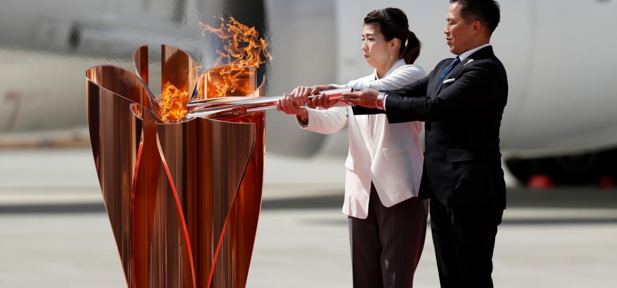 Olympische vlam krijgt sobere ontvangst bij aankomst in Japan