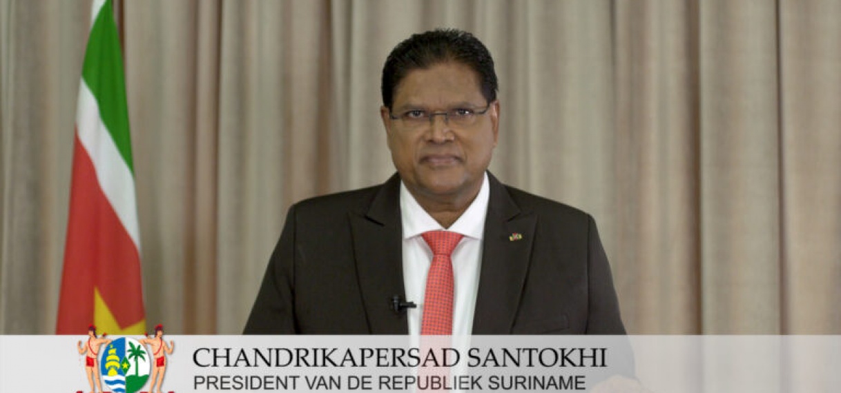 President Santokhi roept op tot nationale opstelling herschikking schulden