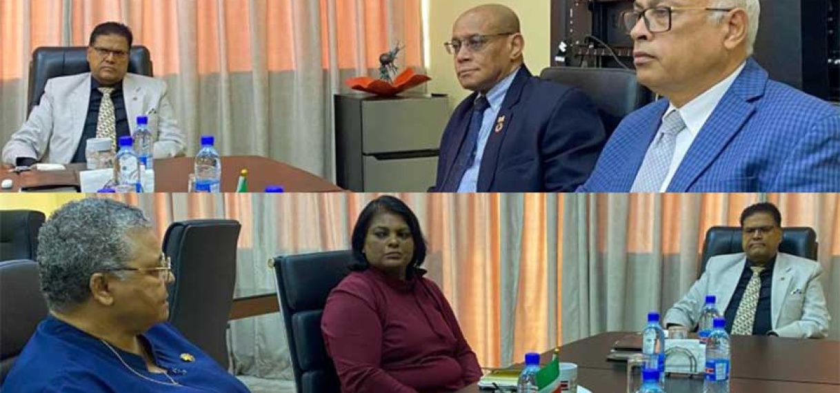 Uittredende ministers in gesprek met president Santokhi